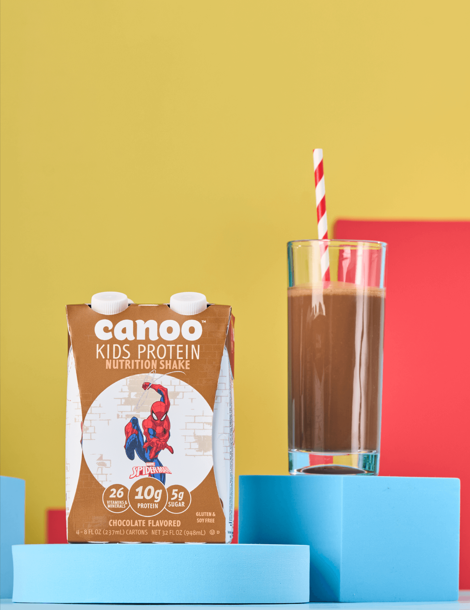 Canoo 4 pack and glass of Canoo on a podium.